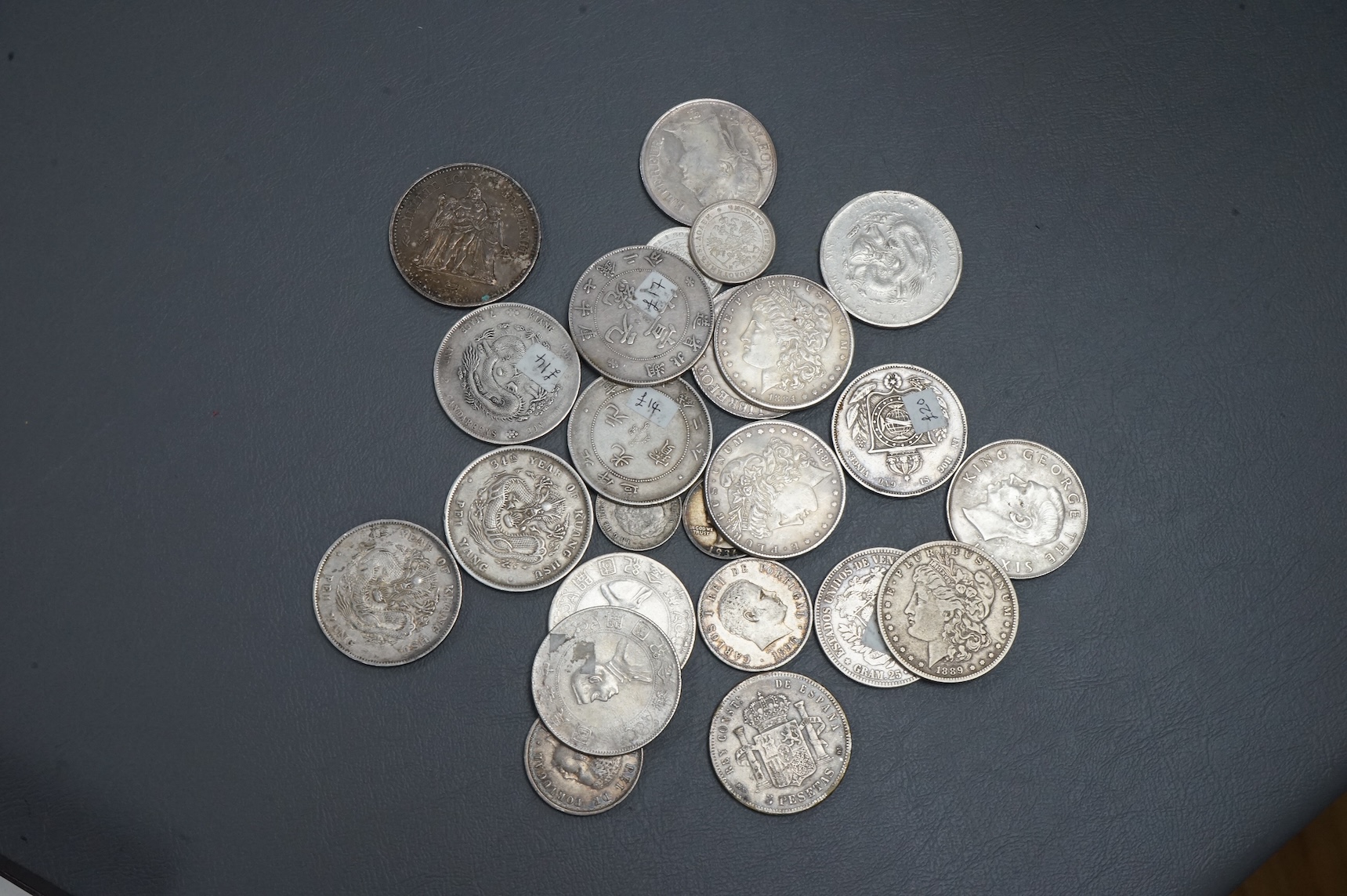 A collection of Chinese, France, Italy silver and coins and other world silver coins, late 19th/20th century